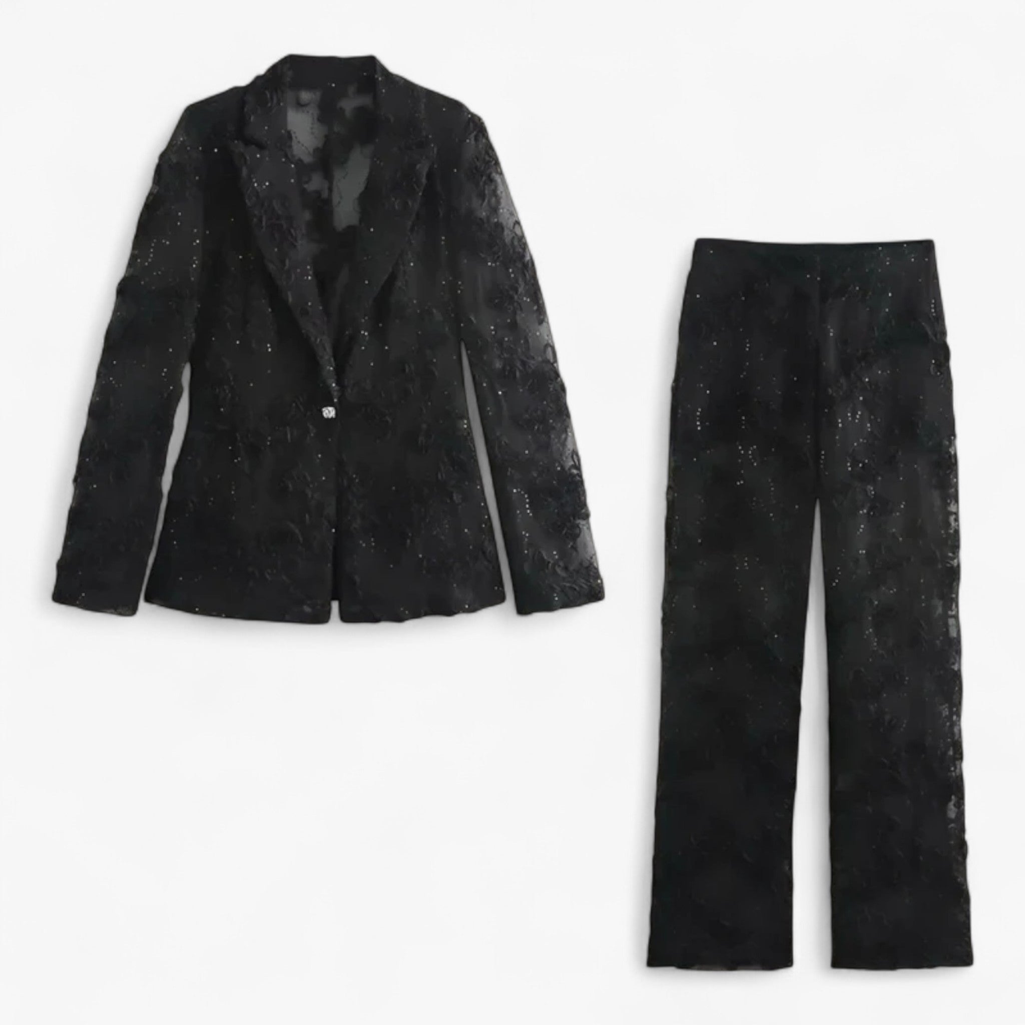 Damesjas met geborduurde parels en een broek met hoge taille